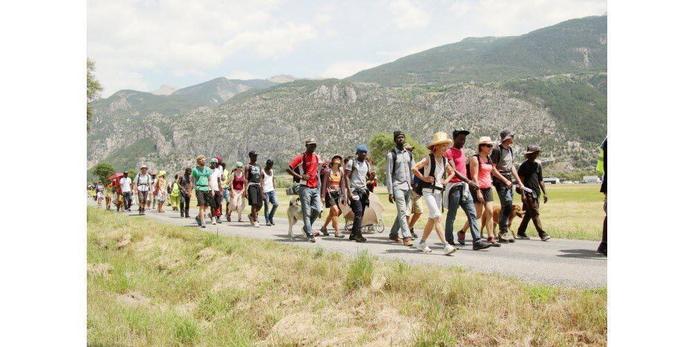 Photographie de la "marche des Soudanais", juillet 2017. Source : Le Dauphiné Libéré