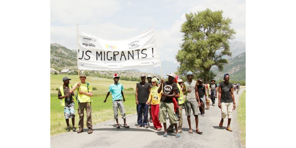 Photographie de la "marche des Soudanais", juillet 2017. Source : Le Dauphiné Libéré 